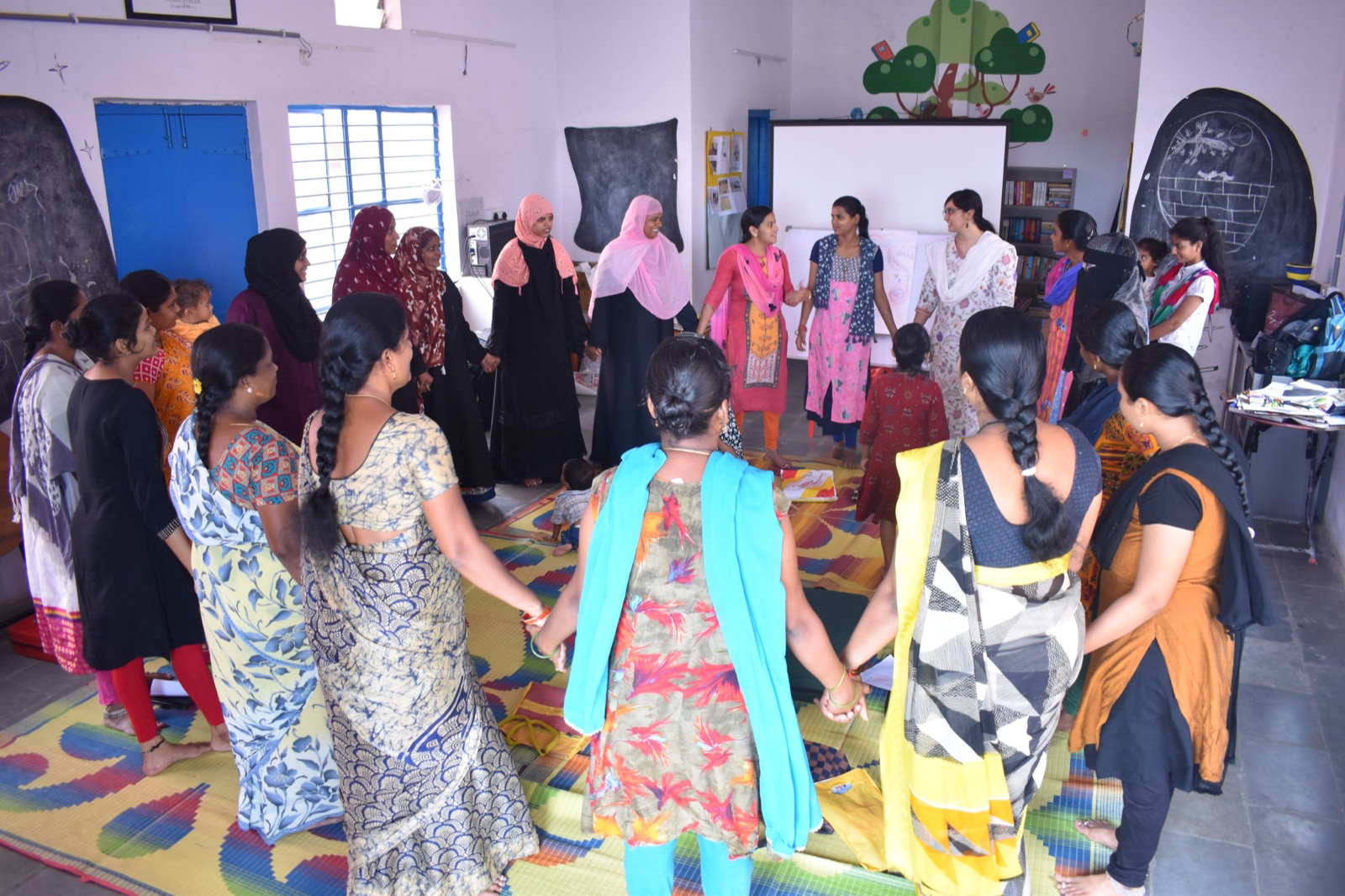 UMEED women gathered in a community circle